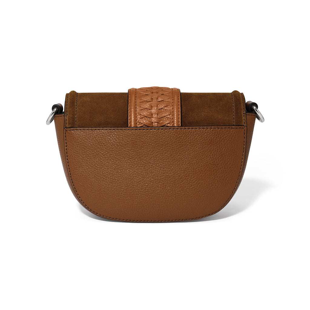 Brown leather handbag with a braided strap on a white background