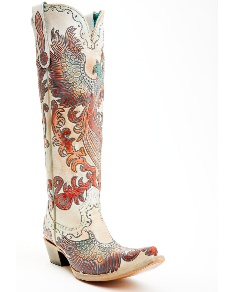 A women's white cowboy boot with hand tooled and painted fire phoenix designs.