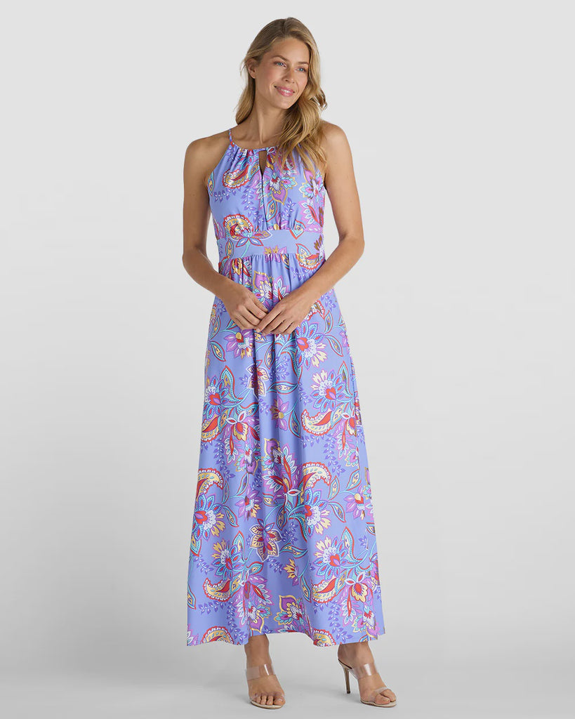 Woman wearing a floral dress on a white background