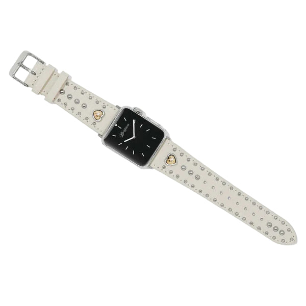 Smartwatch with a decorative white strap featuring small embellishments on a light gray background