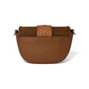 Brown leather handbag with a braided strap on a white background
