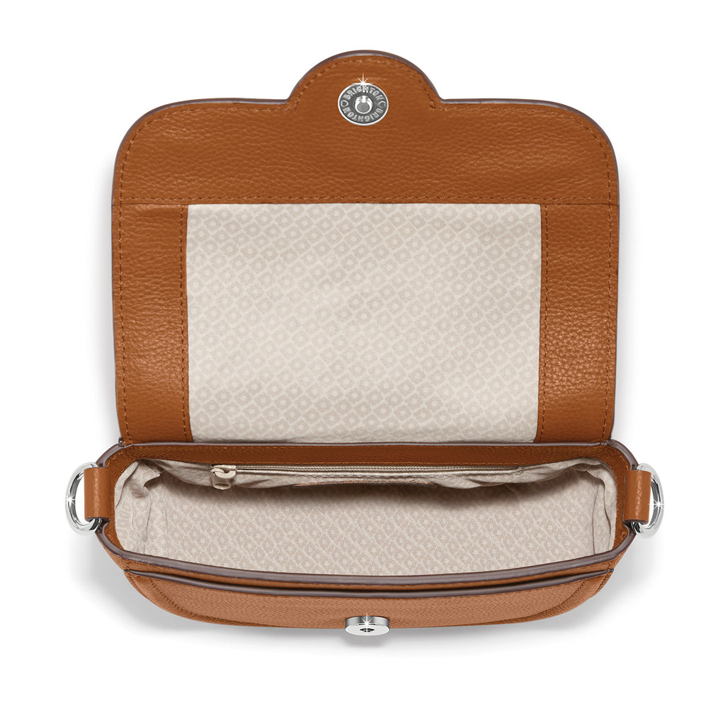 Brown leather handbag with beige interior on a white background