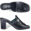 Black high-heeled mule shoe with 'Brighton' branding on a white background
