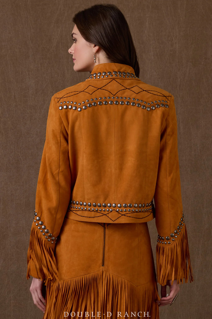 Woman wearing a brown suede jacket with fringe and bead details on a brown background, featuring 'Double D Ranch' branding.