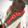 Equestrian Decor Striped Horse Bit Design Throw Blanket Person wearing a patterned scarf with red, green, and yellow colors.