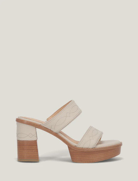 Dark gray sandal with white accents on a white background
