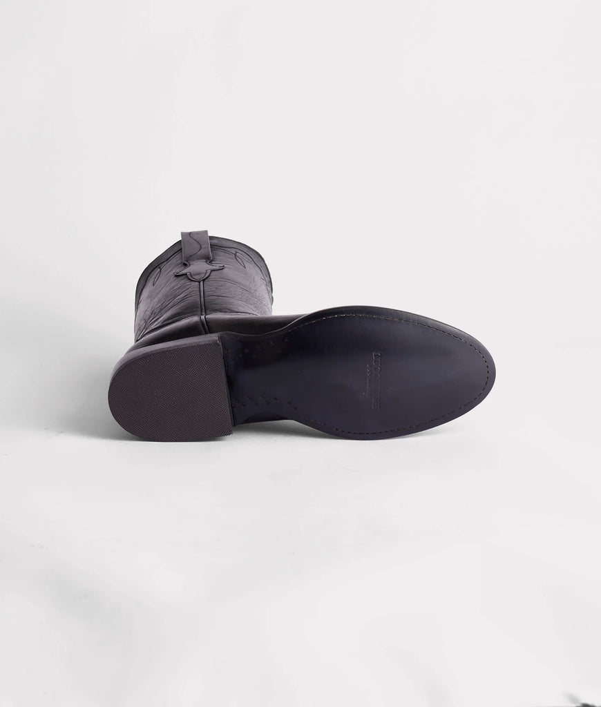 Black boot on a white background