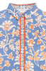 Floral patterned shirt with orange and white details on a blue background