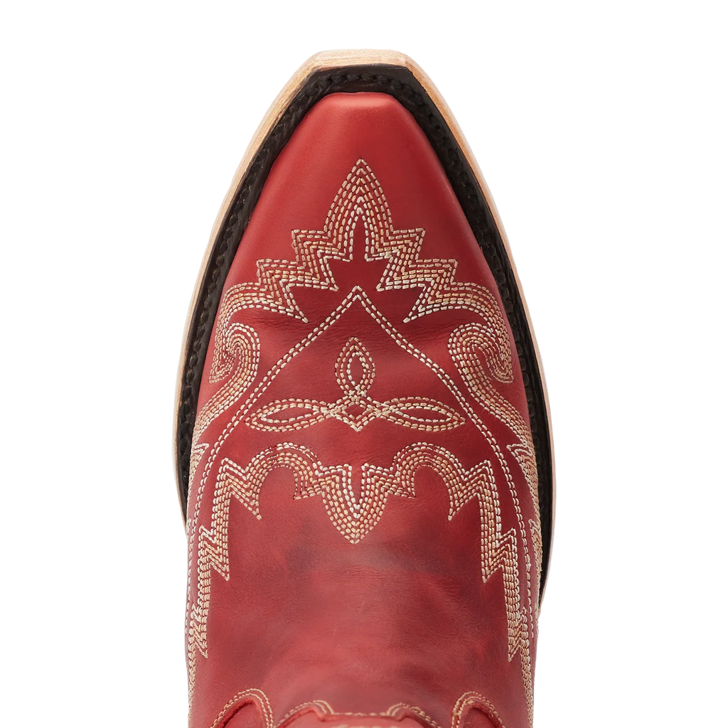 Red cowboy boot with intricate gold embroidery on a white background