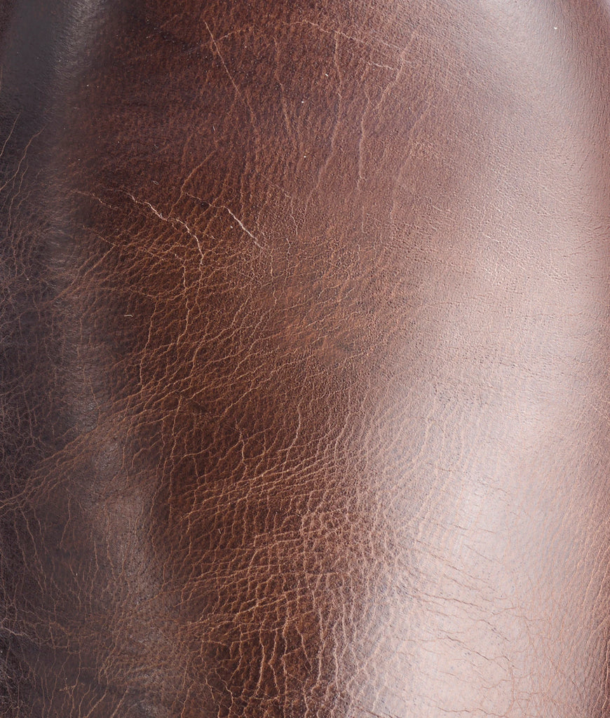 Close-up of brown leather texture swatch