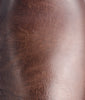 Close-up of brown leather texture swatch