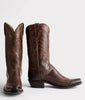 Pair of brown Lucchese cowboy boots on a white background