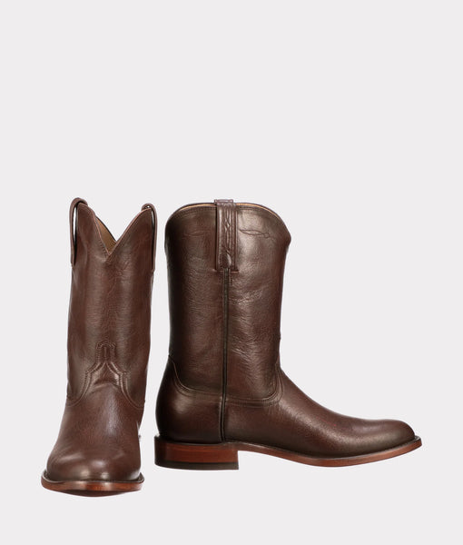 Pair of brown Lucchese Roper leather boots on a light gray background