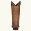 Brown cowboy boot on a white background