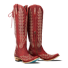 Red cowboy boots with intricate white embroidery on a white background